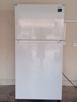 refrigerator Samsung RT21M6215WW/AA is a 33-inch wide, 21.1 cubic foot top-freezer  convertible