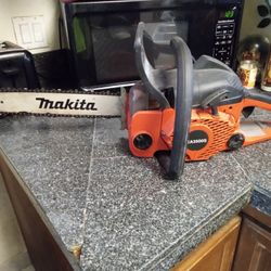 MAKITA CHAIN SAW. 