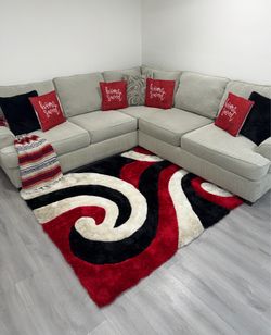 Beautiful 2-Piece Sectional Sofa in Light Gray tone. Delivery available for an additional cost.