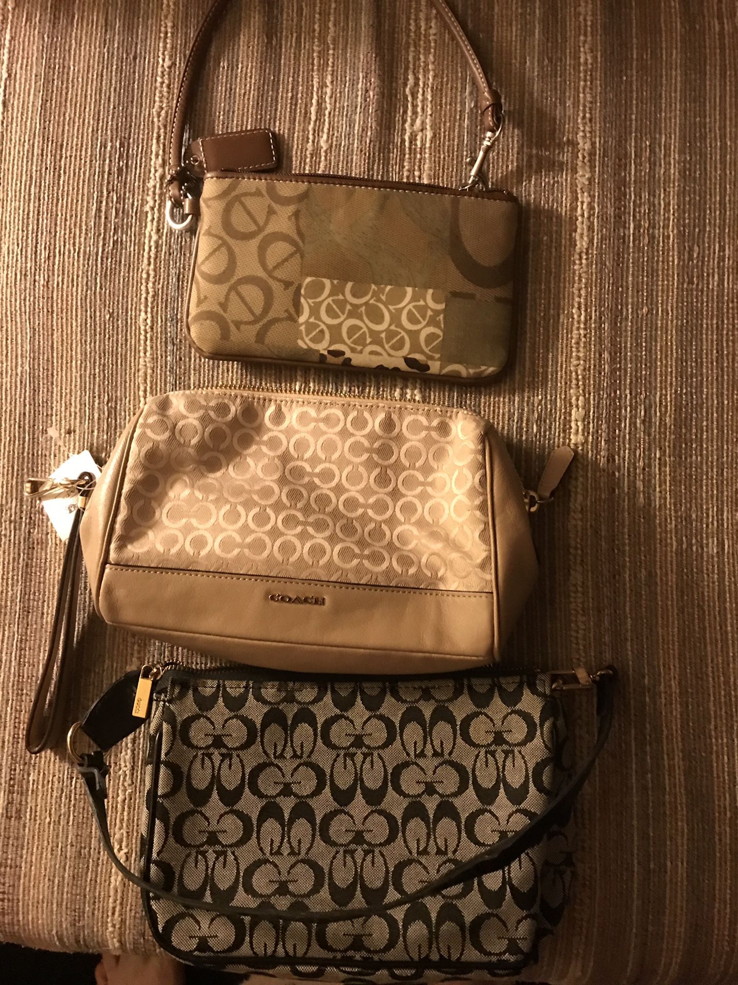 Three coach purse bags never used new