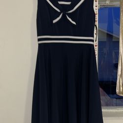 Brand New, “Stop Staring!” Navy blue sailor dress with white lines