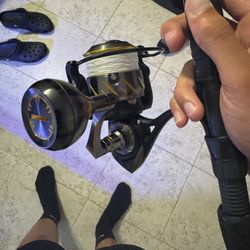 Penn authority 4500hs new with box on a black fin rod