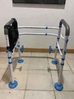 Toilet seat bar and walker
