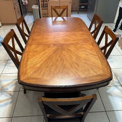 Wooden dinning room table + 6 chairs  and china  cabinet