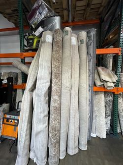 New 8’x 10’ Area rugs