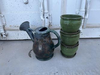 Green pots And Watering Can