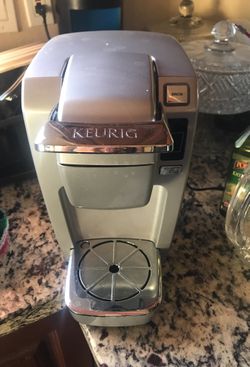 Silver Keurig coffee machine works