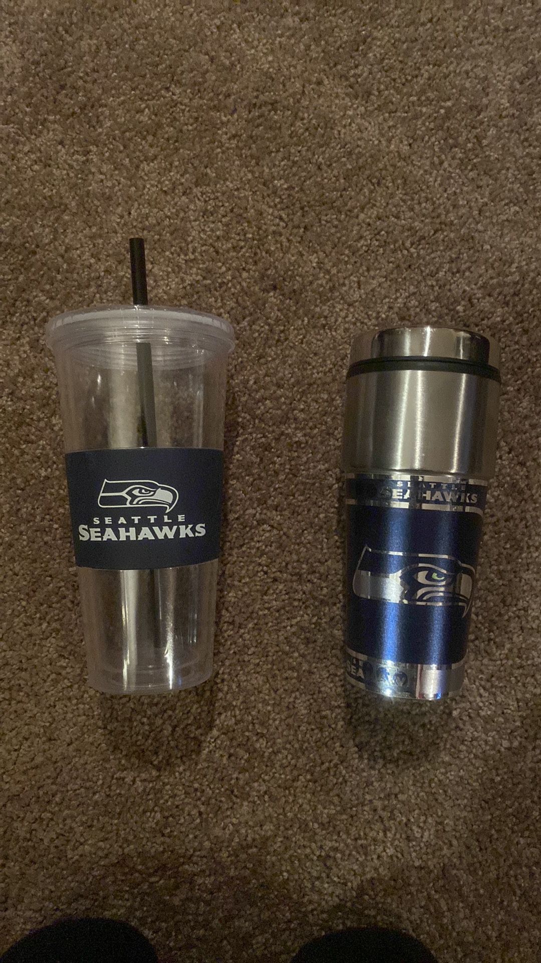 2 gently Used Seahawks Tumblers