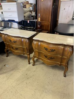 Pair of Louis XV style bombé-form commodes