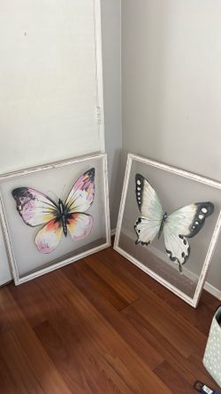 Two butterfly art pieces