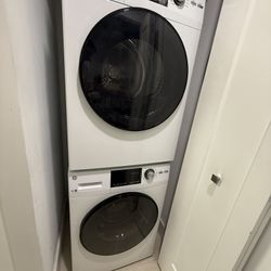 GE® ENERGY STAR® 24" 2.4 CU. FT. FRONT LOAD WASHER WITH STEAM  + GE® ENERGY STAR® 24" 4.3 CU.FT. FRONT LOAD VENTED ELECTRIC DRYER WITH STAINLESS STEEL