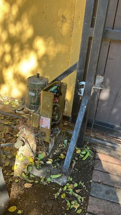 Electric gate noisy or moving uneven? Chain, motor, sensors, and full gate issues
