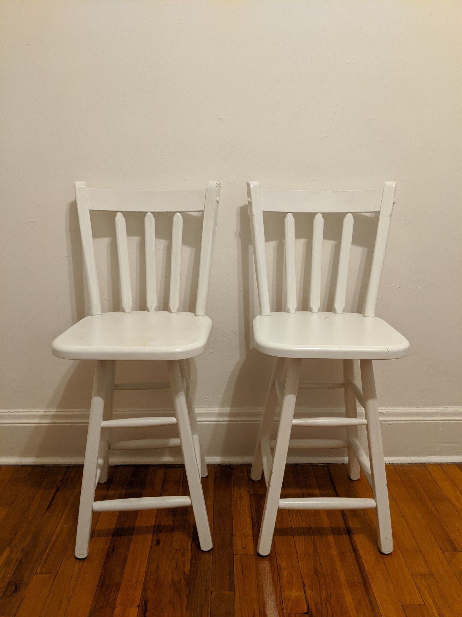 Two beautiful white wooden chairs!