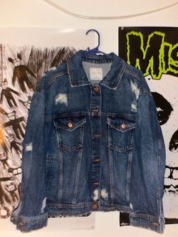 Distressed navy blue jean jacket