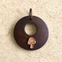 🍄 Pretty, dark brown wood hoop pendant with copper mushroom
