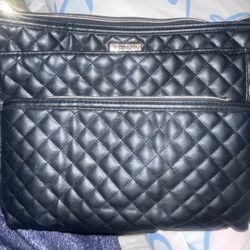 Joan & David Travel Bags