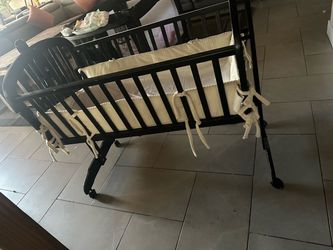 Dark Wood Baby Cradle with Bumper Pads
