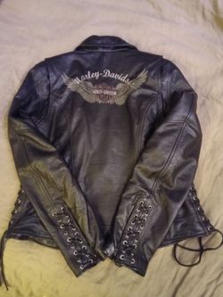 Woman's Harley Davidson leather jacket and chaps