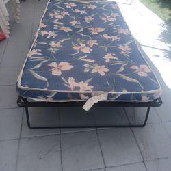 FOLDABLE BED WITH MATTRESES..6 FOOT X 3 