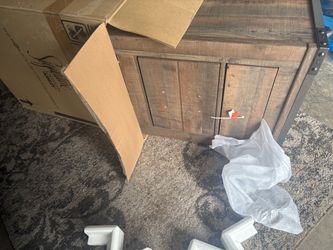 Rustic Wood Cabinet with Metal Corner Accents