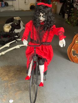 Animated Halloween Creepy Girl on Bicycle