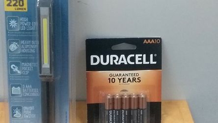 Pen Light And Set Of New Batteries
