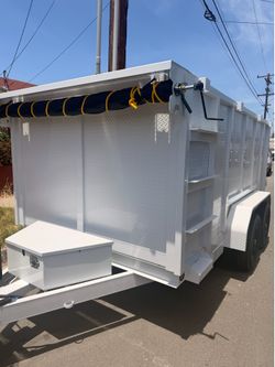 Scissor lift dump trailer