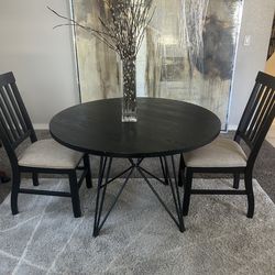 Black dinning table two chairs