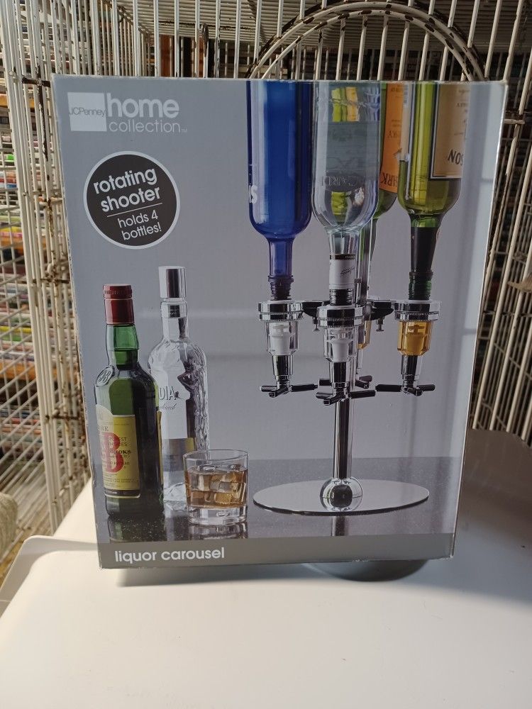 JC PENNY LIQUAR CAROUSEL