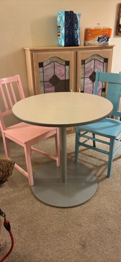 Sturdy table and two chairs