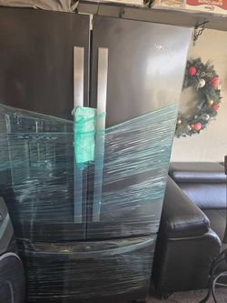 Black Whirlpool refrigerator
