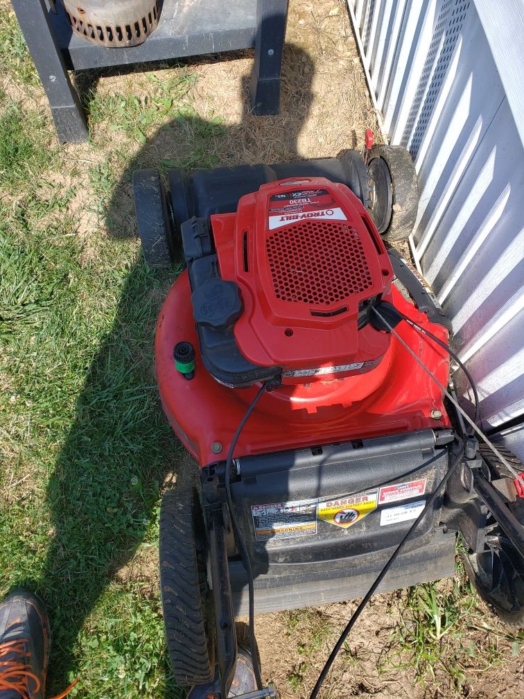 Self propelled lawn mower