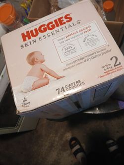 “New unopened Huggies Skin Essentials Size 2 diapers, 74 count.