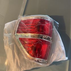 2009 through 2014 Ford F150 left driver side tail light