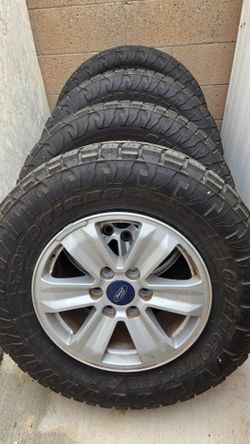 Ford F-150 OEM wheels  with Toyo Open Country A/T III
