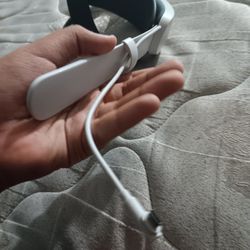 Quest  2 Head Strap  It comes with a Charger. and you can charge your VR While Playing 