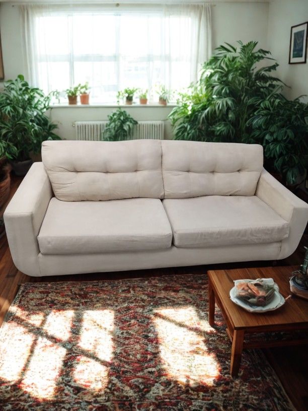 Fabric Par Beige Couch And Rug