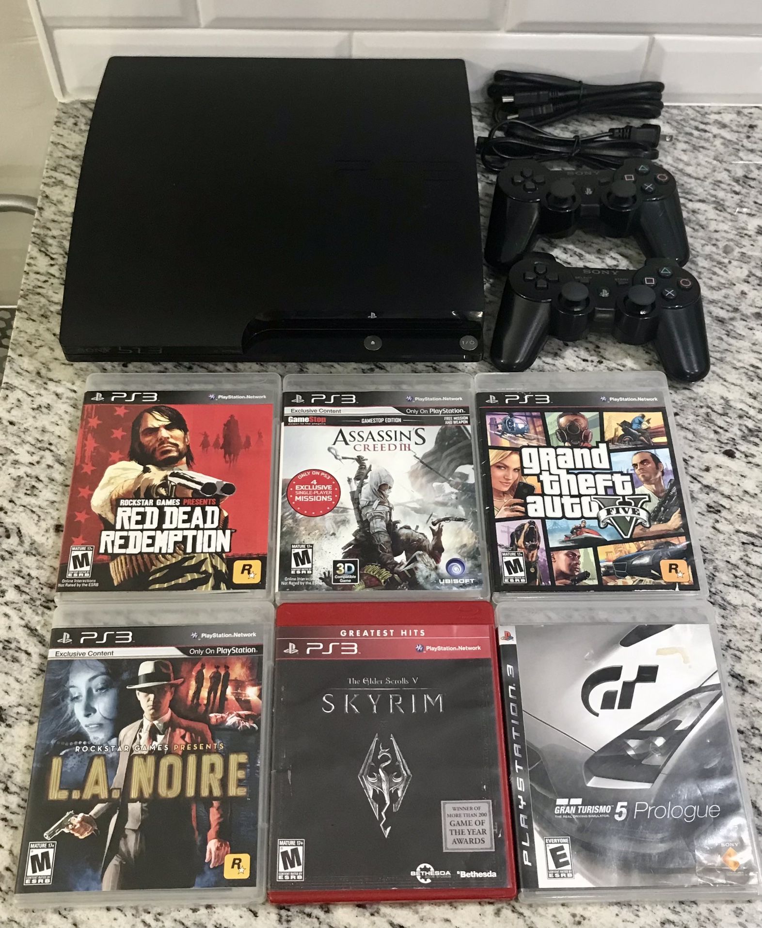 PlayStation 3 with Controllers and Games