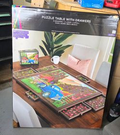 Puzzle table with drawers