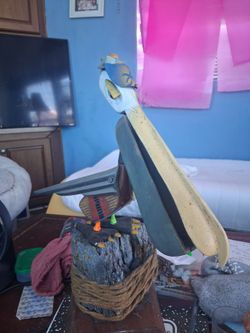 Painted Wood Pelican Sculpture on Rock Base