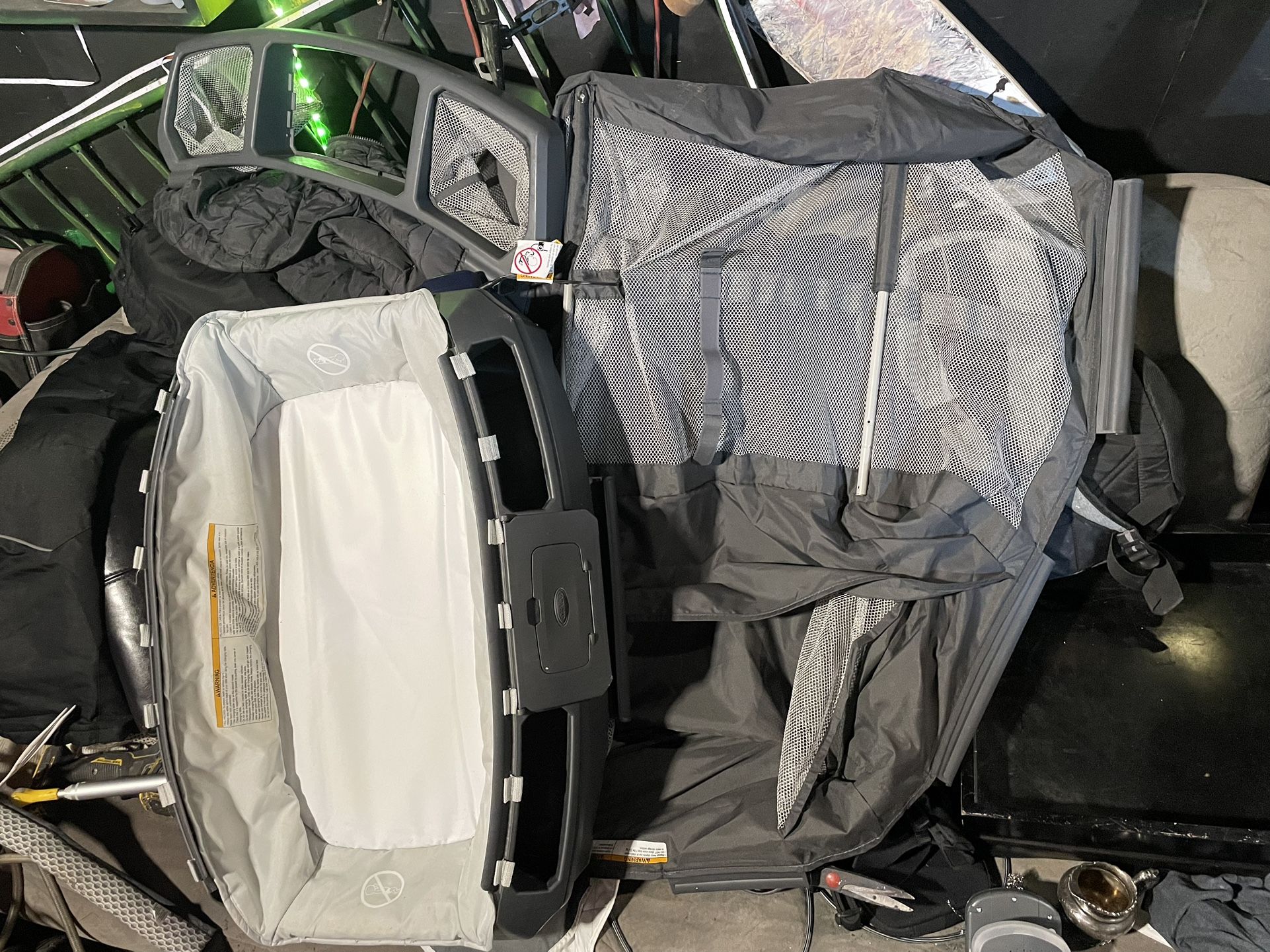 GRACO baby crib or travel playpen (also known as a “pack ’n play”),