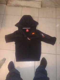 Brand new black and orange Nike tech