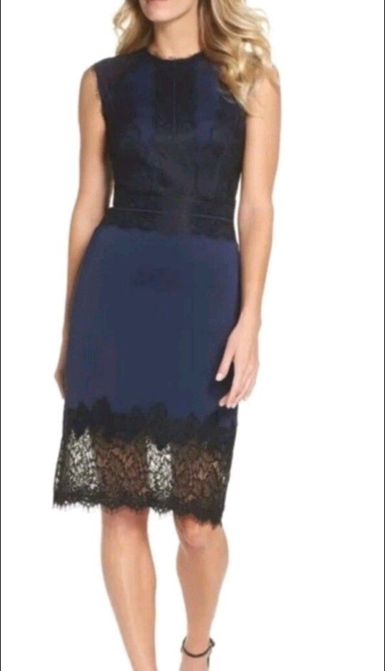 Tadashi Shoji Cocktail Dress Size 12 Neoprene Stretch Scuba Blue Black Lace Trim
Excellent condition, no flaws
Size 12, but it looks like it runs s