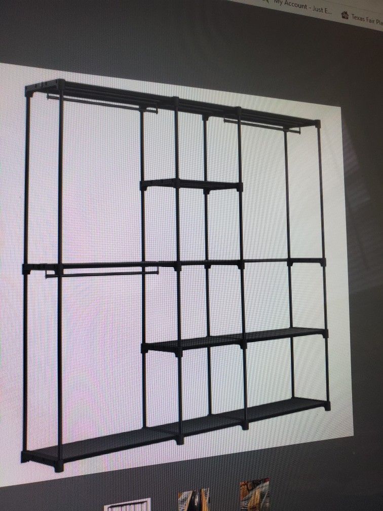 Portable Closet 71 X 16 X 71 PENDING PICK UP STILL AVAILABLE