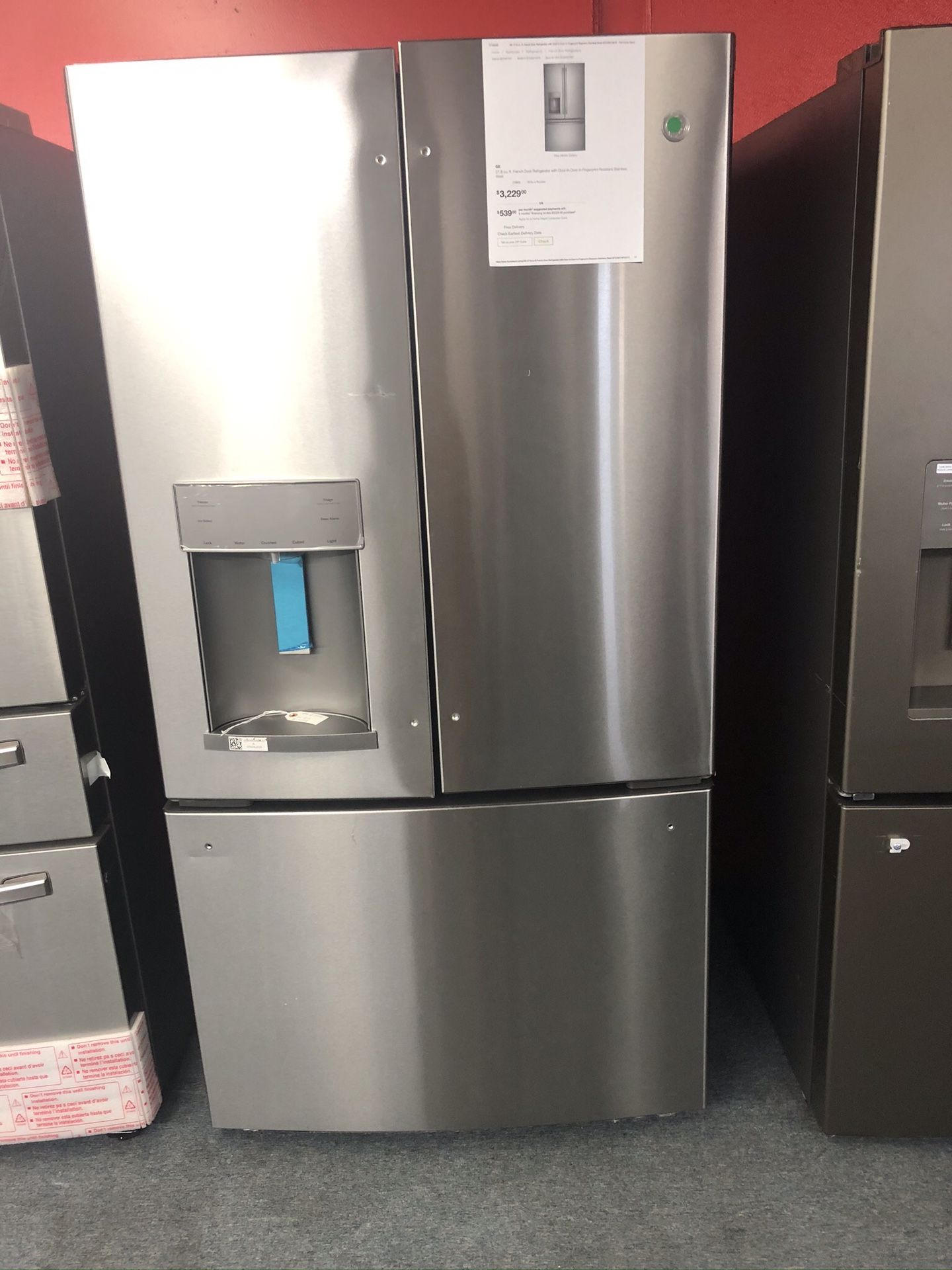 New scratch and dent GE 27 cu ft stainless steel French door fridge. 1 year warranty