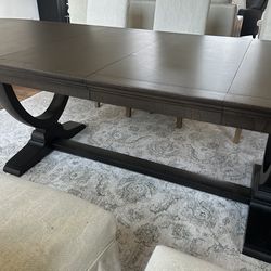 Dark wood dining table, West Elm