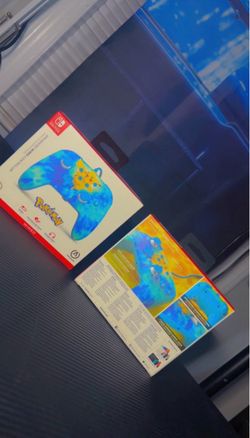 two PowerA Enhanced Wired Controllers for Nintendo Switch in the Tie-Dye Pikachu des new never open
