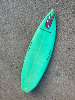 Old school vintage surfboard 5’10
