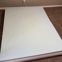 Queen mattress with foam topper