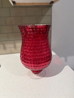 Red hurricane glass footed vase- 12 inches tall and 7 across